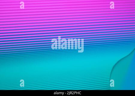 Neon hues over corrugated magenta and teal background. Futuristic abstract backdrop Stock Photo