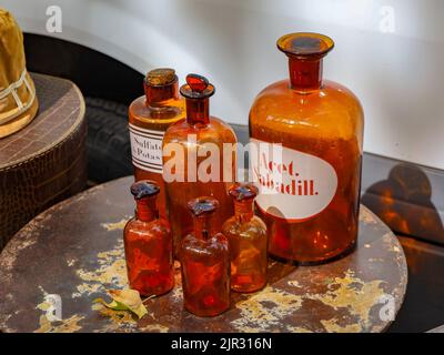 A set of vintage pharmaceutical amber bottles from a Parisian flea market Stock Photo