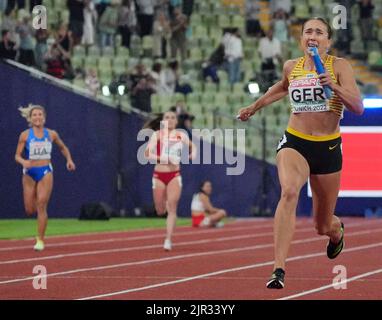 Munich, Germany. 21st Aug, 2022. Athletics: European Championships, Olympic Stadium, final 4x100 meters relay, women, final, Rebekka Haase (Germany) crosses the finish line first and wins the race with the German relay team. Credit: Soeren Stache/dpa/Alamy Live News Stock Photo