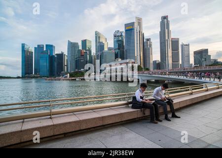 SINGAPORE, MAY 11, 2017; View of Singapore with Singapore skyscrapers. Daily city view. Business people working on computers. Stock Photo
