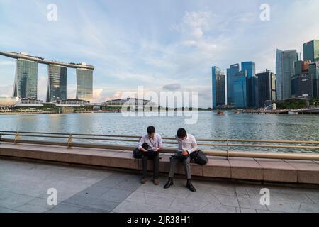 SINGAPORE, MAY 11, 2017; View of Singapore with Singapore skyscrapers. Daily city view. Business people working on computers. Stock Photo