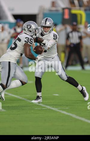 Inglewood, United States. 08th Dec, 2022. Las Vegas Raiders running back  Zamir White (35) and Los Angeles Rams cornerback Derion Kendrick (6)  exchange jerseys after an NFL game on Thursday, Dec. 8