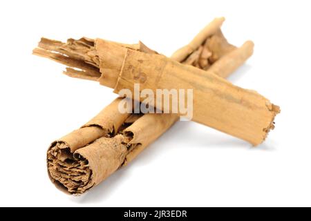 Sri-Lanka cinnamon sticks crossed isolated horizontal Stock Photo