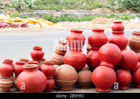 Handmade Terracotta Ceramic Clay-Based Earthenware Used For Cooking Or Storing Food And During Traditional Festival Celebration In India. Piled Up Var Stock Photo