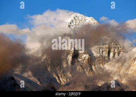 Evening panoramic view of mount Everest with beautiful clouds on the top from Gokyo Ri - Everest area, Sagarmatha national park, Khumbu valley, Nepal Stock Photo