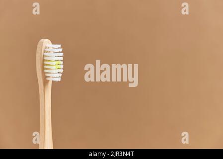 Ecological bamboo toothbrush. Concepts: sustainable lifestyle, use of compostable and environmentally friendly materials, zero plastics. Studio shot w Stock Photo
