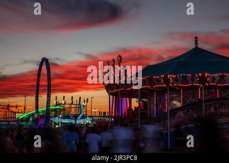 Lights on carnival rides at sunset, Delaware State Fair, Harrington, Delaware Stock Photo