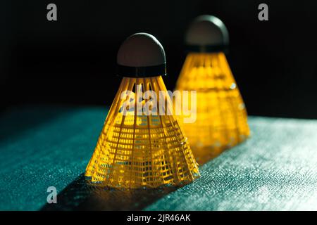 Badminton Birdie . Shuttlecocks in dim light Stock Photo