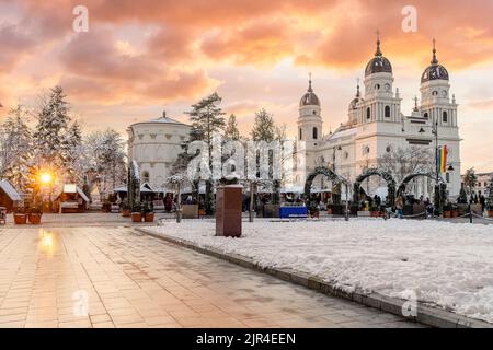 Christmas market and decorations tree in center of Iasi town at sunset, Romania Stock Photo