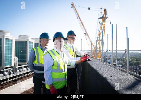 Labour leader Sir Keir Starmer during a visit to the Juniper House housing development in Walthamstow, east London, to see how families will save money on their energy bills through the installation of heat saving measures. Picture date: Monday August 22, 2022. Stock Photo