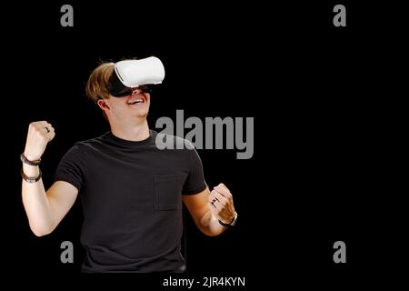 Portrait of a young man with 3D virtual reality glasses. Young man using vr headset, VR goggles Stock Photo