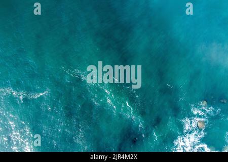 Aerial drone view of blue sea surface Stock Photo