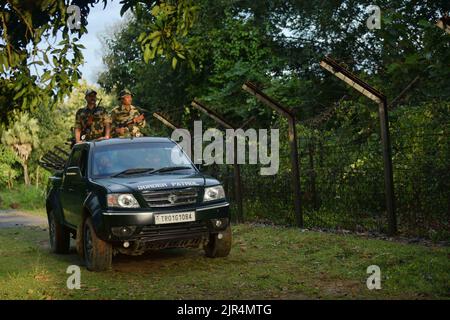 BSF (Border Security Force) personnel are conducting vehicle patrolling along the India-Bangladesh border fencing, ahead of the Independence Day in the Boxanagar area, Agartala. Tripura, India. Stock Photo