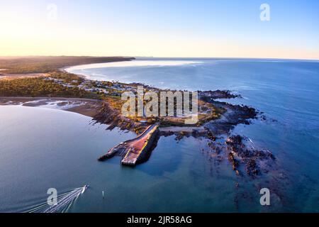 Aerial of the boat ramp at Southend the only village on Curtis Island Queensland Australia Stock Photo