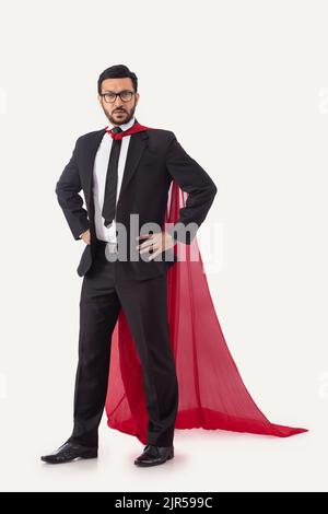 indian man in superhero cape showing his power Stock Photo - Alamy