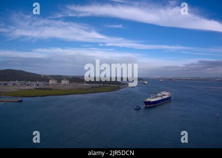 Aerial of LNG Tanker Cesi Beihai berthing at CESI LNG Terminal One  for export from the Curtis Island facility near Gladstone Queensland Australia Stock Photo