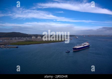 Aerial of LNG Tanker Cesi Beihai berthing at CESI LNG Terminal One  for export from the Curtis Island facility near Gladstone Queensland Australia Stock Photo