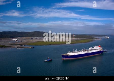 Aerial of LNG Tanker Cesi Beihai berthing at CESI LNG Terminal One  for export from the Curtis Island facility near Gladstone Queensland Australia Stock Photo