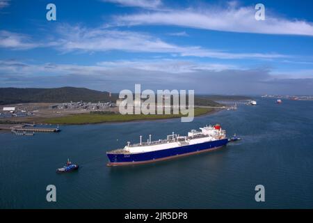 Aerial of LNG Tanker Cesi Beihai berthing at CESI LNG Terminal One  for export from the Curtis Island facility near Gladstone Queensland Australia Stock Photo