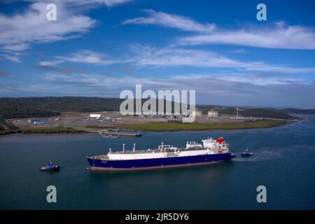 Aerial of LNG Tanker Cesi Beihai berthing at CESI LNG Terminal One  for export from the Curtis Island facility near Gladstone Queensland Australia Stock Photo