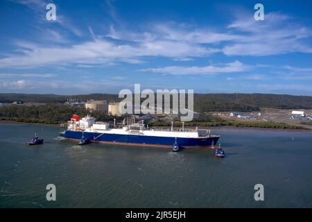 Aerial of LNG Tanker Cesi Beihai berthing at CESI LNG Terminal One for export from the Curtis Island facility near Gladstone Queensland Australia Stock Photo