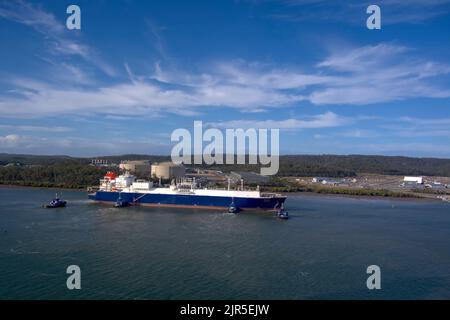 Aerial of LNG Tanker Cesi Beihai berthing at CESI LNG Terminal One for export from the Curtis Island facility near Gladstone Queensland Australia Stock Photo