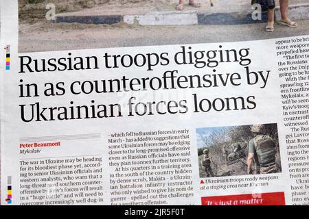 'Russian troops digging in as counteroffensive by Ukrainian forces looms' Guardian newspaper headline article clipping  23 July 2022 London UK Stock Photo
