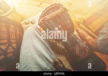 Man playing the drum top view. Stock Photo