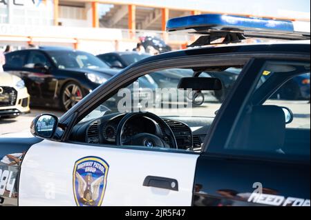 A closeup shot of the BMW E36 police pursuit car patrolling Stock Photo