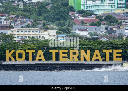 Large sign of Kota Ternate at the foot of the city. Ternate Island, North Maluku, Indonesia. Stock Photo