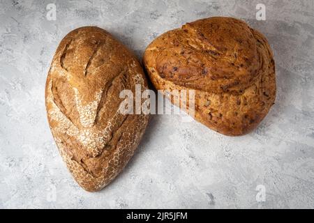 Top of view of two cereal or wholemeal bread molds. Sourdough bread concept Stock Photo