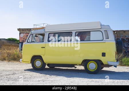 Luz, Lagos Portugal August 17 2022. T2 VW camper in bright yellow side view detail in full sun for rental Stock Photo