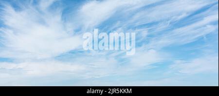 Sky with streaks of white filament clouds Stock Photo