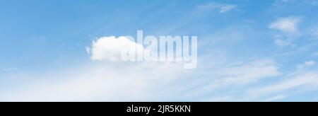 Sky with streaks of white filament clouds, and small white cumulus Stock Photo