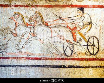 Fresco depicting a duel and two horse chariot in race Andriuolo, Tomb 53 - Eastern slab  (350-330 BC)  - Archaeological area of Paestum - Salerno, Italy Stock Photo