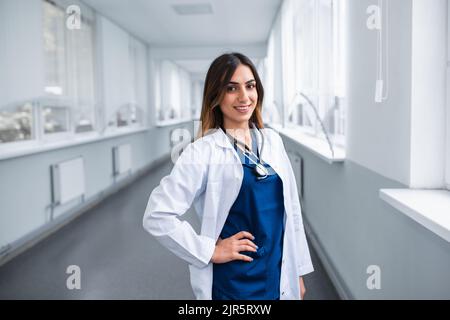 Portrait of a young doctor standing in the corridor of the clinic Stock Photo