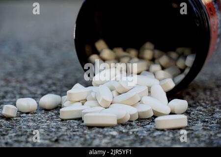 Expired medicine, healthcare concept. prescription drugs on a concrete background. Stock Photo