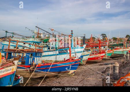 Thai fishing boats at a pier or wharf in Thailand Southeast Asia Stock Photo