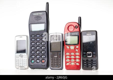 A group of old out dated mobile dumb phones Stock Photo