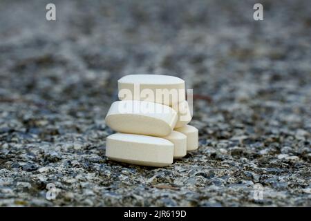 Expired medicine, healthcare concept. prescription drugs on a concrete background. Stock Photo