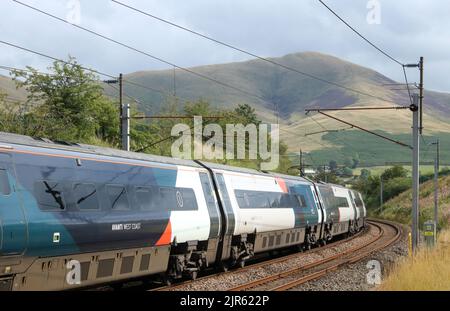 Avanti West Coast class 390 pendolino electric multiple-unit train  390002 on the West Coast Main Line at Lowgill, Cumbria on 22nd August 2022. Stock Photo