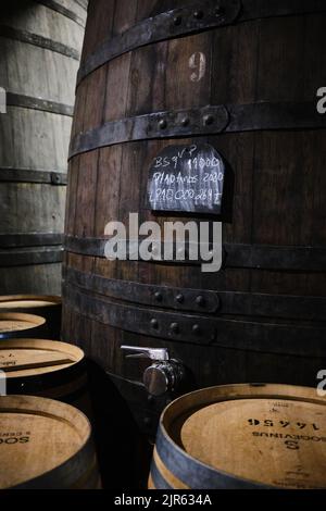 Port barrels in the Quinta S. Luiz with Port wine on the Douro valley estate in Northern Portugal Stock Photo
