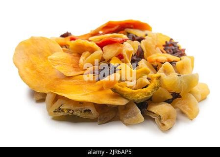 Mix of dried exotic fruit, mangos,slices of pineapples, passion fruit, papaya. Vegetarian dessert. Stock Photo
