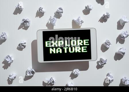 Conceptual caption Explore Nature. Conceptual photo Reserve Campsite Conservation Expedition Safari park Paper Wraps Placed Around Tablet With Stock Photo
