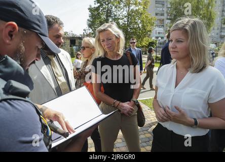 2022-08-22 11:24:13 Dutch Minister of Foreign Trade and Development Liesje Schreinemacher (R) and Minister of Defense Kajsa Ollongren (L), attend their visit to the city of Irpin to meet with local officials, near Kyiv, Ukraine, 22 August 2022. Dutch Ministers of Foreign Trade and Development Liesje Schreinemacher and Minister of Defense Kajsa Ollongren visit Kyiv and suraund cities to meet with Ukrainian officials. Irpin as well as other towns and villages in the northern part of the Kyiv region became battlefields and were heavily shelled when Russian troops tried to reach the Ukrainian capi Stock Photo