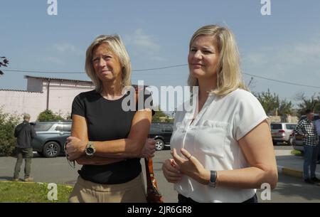 2022-08-22 11:18:53 Dutch Minister of Foreign Trade and Development Liesje Schreinemacher (R) and Minister of Defense Kajsa Ollongren (L), attend their visit to the city of Irpin to meet with local officials, near Kyiv, Ukraine, 22 August 2022. Dutch Ministers of Foreign Trade and Development Liesje Schreinemacher and Minister of Defense Kajsa Ollongren visit Kyiv and suraund cities to meet with Ukrainian officials. Irpin as well as other towns and villages in the northern part of the Kyiv region became battlefields and were heavily shelled when Russian troops tried to reach the Ukrainian capi Stock Photo