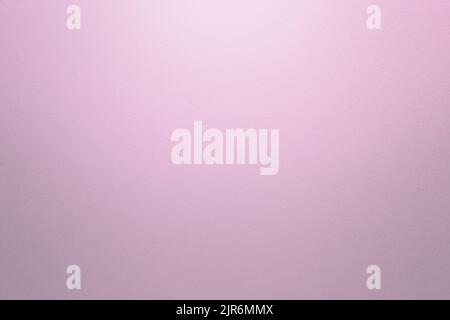 Light pink paper background with light effect. Abstract full frame textured paper background with copy space. Stock Photo
