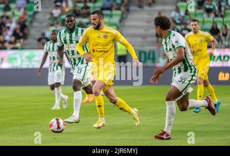 BUDAPEST, HUNGARY - JULY 13: Aleksa Amanovic of FC Tobol challenges  Kristoffer Zachariassen of Ferencvarosi TC during the UEFA Champions League  2022/23 First Qualifying Round Second Leg match between Ferencvarosi TC and