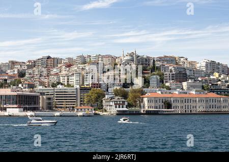 View of a boats on Bosphorus and Gunussuyu area of Beyoglu district in Istanbul. It is a sunny summer day. Stock Photo