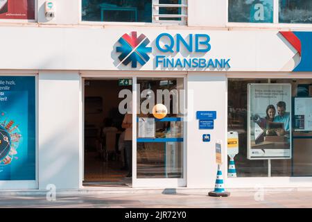 07 July 2022, Antalya, Turkey: QNB finance bank retail branch entrance Stock Photo